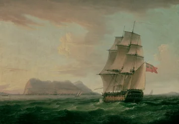 Britský muž války před Gibraltarskou skálou